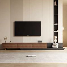 a living room with a large television on the wall