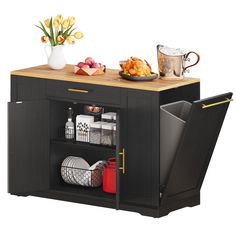 a kitchen island with a cutting board and trays on the top, next to an open dishwasher