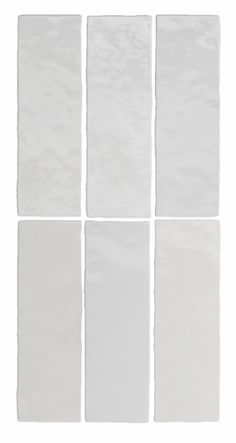 six pieces of white paper on a white background