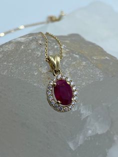 Ruby Gold Necklace, Natural Ruby Gemstone Gold Necklace, Dainty Gold Jewelry, Ruby Women Solitare Necklace, Gift For Wife, Gold Ruby Pendant *100% natural gemstone *14k solid gold *solid gold (NOT plated) *gemstone: ruby *gemstone: zircon *stone shape ruby: oval *stone shape zircon: round *stone ruby : 5x7 mm. *stone ruby ct. : 1.00-1.20 ct. *stones ruby : 1 pc. *stone zircon : 20 pcs. Ruby Jade Gold Necklace, Luxury Red Ruby Temple Necklace, Luxury Red Temple Necklace, Luxury Red Temple Necklace For Gift, Vintage Ruby Necklace, Elegant Ruby Necklace With Halo Setting, Ruby Necklace With Round Stone Setting, Round Ruby Necklace With Stone Setting, Elegant Oval Stone Setting Necklaces