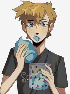 a boy with blue eyes and blonde hair is holding a cup in his hands while he looks at the camera