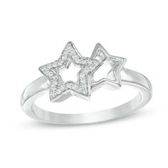 Remind her who's the star with this charming diamond ring. Crafted in cool sterling silver, this petite design features two overlapping open stars - one lined with sparkling diamonds. Bright with 1/10 ct. t.w. of diamonds and a brilliant buffed luster, this stellar style is the perfect anytime surprise. Custom-made to fit her ring size. Sterling silver rings cannot be resized after purchase. Star-shaped Rings With Diamond Accents, Diamond White Star-shaped Anniversary Rings, Sterling Silver Star-shaped Diamond Ring For Anniversary, Star Shaped Diamond Promise Ring, Star-shaped Promise Ring With Diamond Accents, Star Shaped Diamond Rings With Accents, Star-shaped Diamond Anniversary Ring, Sterling Silver Star-shaped Diamond Ring, Star-shaped Diamond Anniversary Ring With Accents