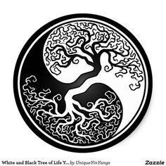 a white and black yin - yang tree on a black background