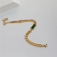 Gold tone Stainless Steel Eva Classic Emerald Jewelry Set from Glazd Jewels Everyday Luxury Green Jewelry, Trendy Green Chain Bracelet As Gift, Trendy Green Chain Bracelet For Gift, Trendy Green Stackable Jewelry, Green Stainless Steel Jewelry With Adjustable Chain, Modern Green Stainless Steel Jewelry, Emerald Jewelry Set, Emerald Chain, Emerald Bracelet