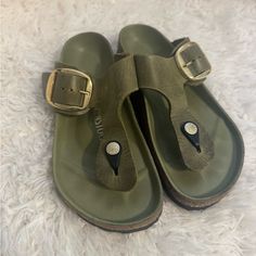 An Oversized Buckle Gleams At One Side Of A Flip-Flop Styled With Straps Of Contoured Leather And A Footbed Molded To Support The Natural Movement Of Your Foot. Worn Once Green Leather Flip Flops With Round Toe, Casual Green T-strap Sandals, Shoes Birkenstock, Flip Flops Style, Natural Movement, Birkenstock Shoes, Birkenstock Gizeh, Flip Flop, Women's Shoes Sandals