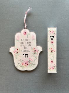 a ceramic hamsah with the words may you be beloved with love and happiness