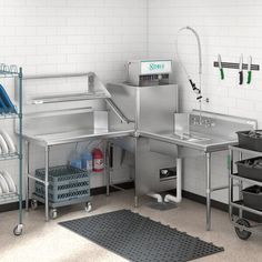 an industrial kitchen with stainless steel appliances and cleaning supplies