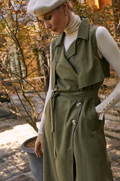 This stylish belted trench has been accented with large tortoise buttons, a matching fabric belt, and an elegant lapel-collar. Designed in a sleeveless midi silhouette it's easy to style with a camisole, blouse, or fitted turtleneck. Content: 100% Linen Hand wash warm Button-down style Belted Unlined Length: S = 119 cm (46.5") M = 122 cm (47.5") L = 125 cm (49") XL = 128 cm (50") 2XL = 130 cm (50.5") 3XL = 132 cm (51.5") Sleeveless Trench, Trench Dress, Fitted Turtleneck, Feeding Kids, Belted Trench Coat, Neutral Fashion, Fabric Belt, Dress Pant, Womens Clothing Sizes