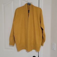 Brand New With Tags Size Medium Color: Mustard Golden Color Soft And Cozy Open Front Cardigan! Has Front Pockets I Am Sensitive To Wool And Itchiness But This Feels Very Soft And Not Itchy - In My Opinion Purchased From Abercrombie Myself But Never Worn And In Perfect Condition Smoke Free And Pet Free Home Yellow Winter Sweater For Workwear, Yellow Winter Sweater For Work, Yellow Winter Outerwear For Layering, Yellow Long Sleeve Sweater For Layering Outfits, Yellow Winter Sweater For Layering, Yellow Knit Cardigan For Layering, Casual Yellow Cotton Cardigan, Mustard Cotton Long Sleeve Sweater, Yellow Knit Long Sleeve Outerwear