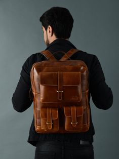 "If you're looking for a stylish and functional backpack online, you've come to the right place. Our MaheTri Portland Leather Backpack is designed with genuine, soft, and lightweight leather that's perfect for day-to-day activities. Our leather backpack is also comfortable to wear, with enough room for every essential thing a person needs. The straps are adjustable, so you can adjust them as per your fit. And the backpack is also very lightweight, so you can easily carry it around. If you're looking for a backpack that'll make you feel comfortable and confident, Mahetri Portland is the perfect choice for your needs.\" Features Material: Buffalo Leather Colour: Tan Brown Strength: Well-stitched with hard nylon thread. Adaptable: This unisex backpack and cross-body laptop bag are effortlessl Leather Backed Backpack For Everyday Use, Business Backpack With Waxed Finish, Leather Laptop Backpack For Everyday Carry, Everyday Carry Backpack With Adjustable Strap, Functional Backpack, Leather Laptop Backpack, Camera Backpack, Unisex Backpack, Laptop Rucksack