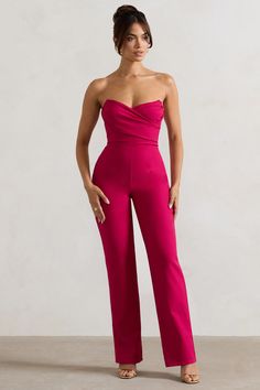 Bring a Tuscan feel to your formal wardrobe with this classic strapless jumpsuit. Meaning beauty in Italian, Bellezza features a bandeau neckline and a boned corset to accentuate and contour your waistline. Finished with long wide legs, this pink jumpsuit is set to sell out this season. Features- Premium stretch crepe- Strapless bandeau neckline- Boned corset bodice- Invisible zip closure- Wide legs Sizing & FitModel is 5'8 and wears UK size 8 / US size 4Product InformationDesigned exclusively by Club L LondonFully lined with good stretchPremium crepe in Hot Pink (86% Polyamide, 14% Elastane)Lining (97% Polyester, 3% Elastane)85cm inside leg lengthSKU: CL128627037 Black Tie Gala, Corset Bodice, Strapless Bandeau, Pink Jumpsuit, Party Dress Long Sleeve, Strapless Jumpsuit, Christmas Party Dress, Black Sequin Dress, Black Velvet Dress