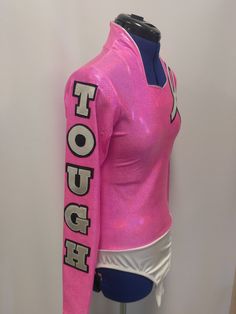 "This gorgeous \"Tough Enough\" shirt is the perfect eye-catching top for any Tough Enough To Wear Pink night at the rodeo. Silver letters backed in black assure that everyone in the stands will be able to see! Zip back and our signature brief to help it stayed tucked in! Crystal swarovski rhinestones can be added for an extra fee. Merchandise is shipped within 1 to 3 weeks. If needed by a certain date, message us right away, call us at 435.257.2286 , or e-mail us at gloria [!at] rodeoqueenshirt Queen Shirt, Rodeo Cowgirl, Rodeo Queen, Queen Shirts, Perfect Eyes, Wear Pink, Pink And Black, Back To Black, Rodeo