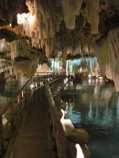 the inside of a cave filled with lots of water