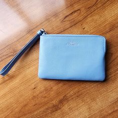 Coach Corner Zip Up Wristlet In Baby Blue/ Waterfall Color. Blue Fabric Lining And Silver Colored Hardware. 6 1/4in (H) 4in (L) Brand New! Elegant Blue Pouch Wristlet, Coach Blue Wristlet For Travel, Elegant Blue Coach Wallet, Coach Blue Wristlet For Daily Use, Blue Coach Bags With Zipper Closure, Coach Bags, Blue Fabric, Baby Blue, Zip Ups