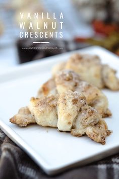 vanilla walnut crescents on a white plate with text overlay that says vanilla walnut crescents