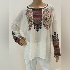 Nwt Gorgeous Johnny Was Anshi Blouse. Beautifully Embroidered Floral Front In Lovely Autumn Colors. Embroidered Sleeves And Back As Well. It’s Like Wearing A Work Of Art. Relaxed Fit. Perfect With Jeans Or Even A Night Out. Originally $310. Festive White Top With Embroidered Sleeves, White Embroidered Tunic Top, White Bohemian Embroidered Tunic Top, Bohemian White Embroidered Tunic Top, Traditional Long Sleeve Tunic With Embroidered Sleeves, Festive White Blouse With Embroidered Sleeves, Bohemian Chikankari Embroidered Tunic Top, Resham Embroidery Tunic Top, Red Long Sleeve Tops With Resham Embroidery