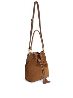 Meet the Bibury – our first ever bucket bag! Crafted from oh-so-soft suede with a subtle hint of structure, this slouchy bag has the room you need for the day’s essentials without compromising on style. A beautifully braided leather handle and detachable crossbody strap give you two ways to wear this boho dream. Pair it with a flowing maxi dress and your favourite Fairfax & Favor sandals for a laidback look that’ll keep you going all summer. Suede and leather exterior: sensational suede meets lu Luxury Suede Bucket Bag For Travel, Luxury Suede Bucket Bag For Daily Use, Luxury Suede Bucket Bag For Women, Travel Suede Bucket Bag With Adjustable Strap, Luxury Chic Suede Bucket Bag, Everyday Suede Bucket Bag With Adjustable Strap, Luxury Modern Suede Bucket Bag, Sainsburys Bag, Suede Bucket Bag For Shopping