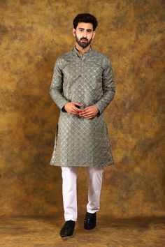 BLUESAANCHI MEN'S DARK GREY EMBROIDERED KURTA SET  This elegant dark grey kurta set from Bluesaanchi brings traditional design together with modern tailoring. Crafted with intricate embroidery, this kurta set is perfect for festive occasions, weddings, or any traditional gathering. Its timeless appeal ensures you make a stylish statement wherever you go.  Key Features  Beautiful dark grey shade with detailed embroidery  Regular fit for a comfortable yet stylish look  Full-sleeved kurta with a mandarin collar  Includes a matching churidar  Perfect for weddings, festivals, and cultural events   Specifications   Brand:  Bluesaanchi   Color:  Dark Grey   Fit:  Regular Fit   Pattern:  Embroidered   Sleeves:  Full Sleeves   Neck Type:  Mandarin Collar   Bottom Type:  Churidar   Occasion:  Ethnic Gray Traditional Wear For Festive Occasions, Gray Festive Traditional Wear, Festive Gray Traditional Wear, Traditional Gray Wear With Pallu, Gray Traditional Wear With Pallu, Gray Traditional Wear For Diwali, Festive Gray Traditional Wear With Pallu, Gray Traditional Wear With Zari Work For Diwali, Festive Unstitched Gray Kurta