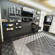 a black and white checkered floor in a garage