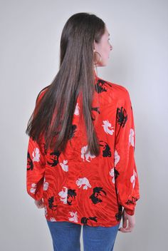 "Flowers print women retro red long sleeve blouse, Size XL Welcome to TARASCOMMON.ETSY.COM Unique clothing from the 20th century. Model tall - 170cm XL. Sleeve - 40cm / 15.74inch; ( armpit to end of sleeve); Width - 60cm / 23.62inch; Length - 65cm / 25.59inch. All measurements are taken seam to seam while lying flat. This item is vintage, so it can have some defects. Additional photos can be send We are glad that you are interested in lots that we sell. Wish you a good shopping! FOLLOW US : Inst Red Graphic Print Blouse For Fall, Spring Long Sleeve Blouse With All Over Print, Vintage Printed V-neck Blouse, All Over Print Long Sleeve Blouse For Summer, Vintage All-over Print Top For Spring, Summer Long Sleeve Printed Blouse, Summer Long Sleeve Blouse With All Over Print, Long Sleeve Blouse With All Over Print For Summer, Red Retro Long Sleeve Top