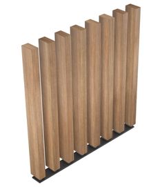 a row of wooden poles sitting next to each other on top of a white surface