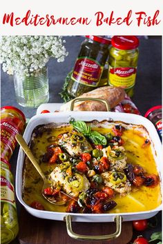 a casserole dish with meat and vegetables in it