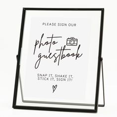 a sign that says, please sign our photo guest snapp it, shake it, stick