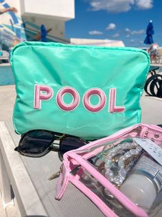 The ultimate poolside bag for sunscreen, mini speaker, snacks and even wet bikinis!
XL Teal nylon with pink rolled patches sewn on
Dimensions: 11 x 5 x 8 inches Playful Cheap Bags For Vacation, Swimwear Bag Packaging, Teal Bag, Pool Bag, Beach Towel Bag, Neoprene Bag, Pool Bags, Heeled Mules Sandals, Beach Swim