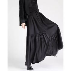 A long patchwork skirt that is characterized by its lightly swaying appearance. An item made of different fabrics spun together with pleats at the hem. A design that widens at the hem. Although it has a dark impression, it releases a dramatic presence. 
 
 
 Size 
 
 S size 
 
 Total length: 96cm 
 Waist: 64-68cm 
 Hip: 104cm 
 
 M size 
 
 Total length: 97cm 
 Waist: 68-72cm 
 Hip: 108cm 
 
 L size 
 
 Total length: 98cm 
 Waist: 72-76cm 
 Hip: 112cm 
 
 XL size 
 
 Total length: 99cm 
 Waist: Flowy Patchwork Tiered Maxi Skirt, Flowy Tiered Patchwork Maxi Skirt, Flowy Patchwork Maxi Skirt, Tiered Patchwork Maxi Skirt, Black Patchwork Tiered Skirt, Black Tiered Patchwork Skirt, Elegant Long Patchwork Skirt, Patchwork Tiered Skirt For Fall, Fall Patchwork Tiered Skirt