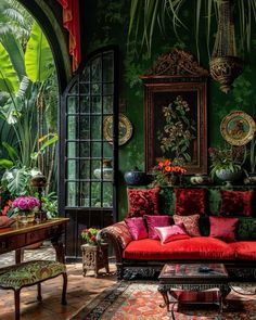 a living room filled with furniture and lots of plants