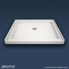 an image of a shower tray on a blue background with the words dreamline above it