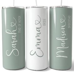 three personalized tumblers with straws in them