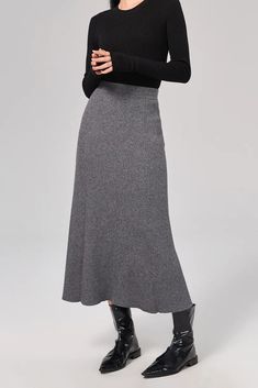 Sophisticated A-line Skirt: Resilient Washable Wool-blend Mastery Our A-line skirt, knit from a blend of washable wool, captures elegance in its purest form. The mid-high waist design elongates the silhouette, while the soft and resilient fabric ensures comfort all day. Style #: WKAI207 Grey Knit Skirt, Fall Midi Skirt, Warm Skirt, Black Knit Skirt, Long Wool Skirt, Midi Skirt Fall, Warm Skirts, Skirt Knit, Tank Top Skirt