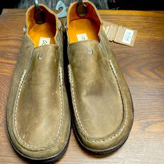 Olukai Mens Moloa Shoes New With Tags Size 9.5 Casual Slip-ons With Leather Footbed And Moc Toe, Rugged Slip-on Leather Shoes With Leather Footbed, Rugged Leather Slip-on Shoes With Leather Footbed, Casual Moc Toe Slip-ons With Leather Sole, Casual Slip-on Leather Shoes With Ortholite Insole, Casual Outdoor Loafers With Plain Toe, Casual Moc Toe Leather Shoes For Outdoor, Casual Plain Toe Loafers For Outdoor, Casual Slip-ons With Leather Sole For Walking