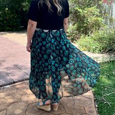 Dive into the Wild West with this Concho Kreek Maxi Skirt! Featuring vibrant turquoise squash blossoms and a black slip underneath, you can be sure to make a statement of style. Ready for a wild and adventurous day? Saddle up and get ready to ride! **This Skirt can be worn as a Maxi Skirt but also as a Strapless Dress!** SIZE OUTSEAM WAIST S/M 39.5" 12.5" L/XL 40" 14.5" 2X/3X 40" 16.5" Turquoise Skirt, Squash Blossoms, Turquoise Squash Blossom, The Wild West, Squash Blossom, Into The Wild, Black Slip Ons, Wild West, The Wild