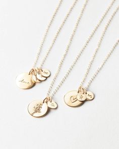 Tell a sparkling story with a symbolic disk paired with (up to five!) tiny initial tags — one for all your loves. Another reason to love this piece: you can add extra initial tags as your story grows! Dainty 14k Gold Filled Engraved Charm Necklaces, Everyday Engraved Flower Pendant Jewelry, Engraved Flower Pendant Jewelry For Everyday, Delicate Personalized Flower Pendant Charm Necklaces, Everyday Jewelry With Flower Charm Pendant, Everyday Jewelry With Round Flower Charm Pendant, Everyday Jewelry With Flower Charm Round Pendant, Everyday Jewelry Pendant With Flower Charm, Everyday Flower Charm Pendant Jewelry