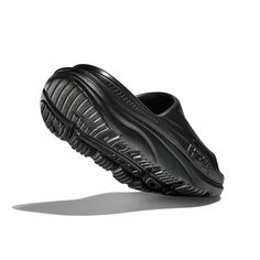 Women's HOKA Ora Recovery Slide 3 - Black/Black Built off the blueprints of the beloved ORA Slide, we’ve added four air flow channels for superior breathability. A comfort-driven style designed for downtime; this sustainable spinoff treads lighter with an earth-friendly sugarcane footbed. Grounded in the same dual-density geometry and injection-molded outsole as the original icon, the ORA Slide 3 delivers foot-cradling comfort in a future-friendly silhouette. DETAILS: BEST FOR: Recovery, Lifesty Outdoor Slippers, Casual Athletic, Branded Gifts, Kids Sandals, Injection Moulding, Earth Friendly, Athletic Sneakers, Dress Sandals, Kids Boots