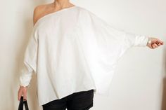 Asymmetrical Top Off Shoulder Tunic Plus Size by atelierPop Oversized Tunic Tops For Day Out, White One-shoulder Blouse For Day Out, White One Shoulder Blouse For Day Out, One Shoulder White Blouse For Day Out, Casual White One-shoulder Blouse, White Drop Shoulder Tops For Summer, White Drop Shoulder Summer Tops, Oversized Off-shoulder Summer Tops, Oversized Off-shoulder Tops For Summer