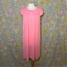 Vintage (60s Or 70s) Nylon Nightgown In Peachy Pink With Lace Trim And Detail. Sweet Peter Pan Collar. New With Tags, Dead Stock. Size Small. Bust: 22” From Pit To Pit Length: 40” 13 Vintage Sheer Sleepwear For Sleepover, Retro Nightgown For Sleepovers, Vintage Nightgown For Spring Party, Vintage Nightgown For Sleepovers, Vintage Dresses For Pajama Party, Spring Retro Nightgown For Sleep, Retro Pink Sleepwear For Spring, Vintage Pink Sheer Nightgown, Vintage Sheer Pink Nightgown