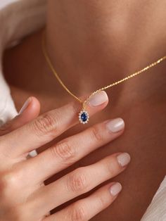 Your Blue Sapphire Oval Pendant is stylish, dainty and pretty ideal for everyday use. Details of solid gold handmade Minimalist Sapphire Necklace are very eye-catching. It is a great gift for your loved ones. This jewelry will be an indispensable piece of yours. This meaningful Sapphire Halo Necklace with high quality handwork will be a legacy you can leave to your family its.  * Gold Sapphire Necklace Details * Material / Gold Kt:  14K (585), 18K (750), 8K (333) * Available Gold Colors: Yellow Dainty Gold-plated Oval Necklace, Dainty Gold Plated Oval Necklace, Dainty Oval Gold Plated Necklace, Dainty Oval Jewelry For Her, Dainty Necklace With Adjustable Oval Chain, Dainty Oval Jewelry Gift For Her, Elegant Blue Jewelry With Delicate Chain, Dainty Oval Sapphire Jewelry, Dainty Blue Teardrop Pendant Necklace