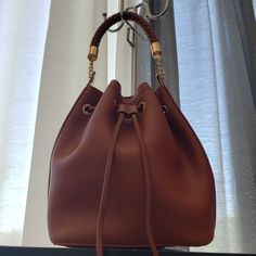 Brand New Mini Hobo Bag, Just Arrived At Our Boutique. Chic Bucket-shaped Hobo Bag For On-the-go, Chic Brown Bucket-shaped Satchel, Chic Brown Bucket Shape Satchel, Brown Bucket Shaped Satchel With Detachable Strap, Brown Bucket-shape Satchel With Detachable Strap, Chic Bucket Shaped Hobo Bag For On-the-go, Chic Hobo Bag For On-the-go In Bucket Shape, Brown Bucket Satchel With Detachable Strap, Chic Bucket Shape Hobo Bag For On-the-go