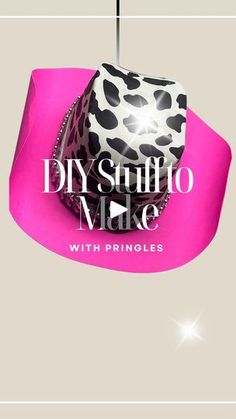 a pink and black object with the words diy sumo make on it