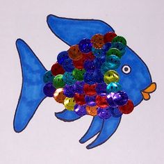 a blue fish made out of plastic beads