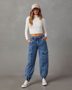 ● Fitted ● High rise ● Jogger silhouette with stretch waistband & elastic cuffs ● Cargo pockets & side slip pockets ● Contrast stitching ● Front zip fly & button closure ● 60% Cotton 40% Polyester ● Hand wash cold, lay flat to dry. Cargo Jeans Outfit Women, Cargo Jeans Outfit, Western Wear Dresses, Jeans Outfit Women, Denim Joggers, Dresses By Length, Black Friday Shopping, Wrap Sweater, Fall Shopping