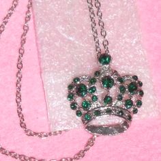 New Necklaces With Assorted Colors Of Crystal Stones In Choices Of: Peridot Emerald Green Blue Sapphire All In Silvertone Alloy Setting. Crowns Are About 1½" Wide. This Listing Is For One. For Sale In My Salon Boutique For $14.95 Each. Chain Sizes Shown Against Measuring Tape. If You Need An Extra Inch, Please Comment & I Will Modify For You. Applicable Discounts: Bundle With Another Item Of The Same Value Or Higher & Get $2 Off Your Total. Reduced No Offers Will Be Sent To Likers. Green Rhinestone Necklace Gift, Green Jewelry With Silver Chain, Silver Rhinestone Necklace Embellished As A Gift, Silver Rhinestone Costume Necklace For Gift, Green Rhinestone Costume Jewelry Necklace As Gift, Crown Pendant Necklace, Jewelry Royal, Crown Pendant, Peridot Green