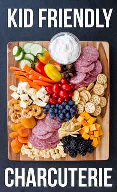 a wooden cutting board topped with different types of food