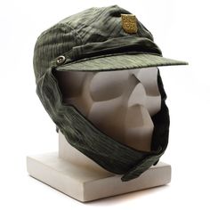 "Genuine Czech/Slovakian army camouflage cap M60 with metal insignia badge Czechoslovakian army issued model 1960's/1970's field cap. Similar to the east German NVA rain drop pattern camouflage Hat features button over the top ear flaps and adjustable chin strap Condition Like new, unused Shipping to United states, Canada, Europe * Economy shipping Shipping time : 7-21 working days or sometime more * Standard shipping with tracking information Shipping time : 7-14 working days or sometime more S Military Style Baseball Cap For Outdoor, Military Cap For Hunting, Military Style Outdoor Hat, Green Military 5-panel Hat, German Hats, Olive Hat, Sick Clothes, Camouflage Hat, Army Hat