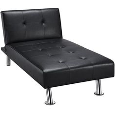 a black leather bed with chrome legs and footrests on an isolated white background