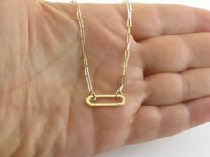 Fabulous 14k Yellow Gold Paperclip Carabiner Chain Necklace Material: 14k gold, Not plated or filled Legth: 18" long  Width: 2 mm wide links Carabiner Size: 3/4" long by 1/4" wide Weight: 4.2 grams  Clasp: Carabier Bottom part opnes and snaps close Gift Box included  Images may be enlarged to show detail and the item may look larger than it appears in person.In order to reduce buyer remorse and return please pay attention to the photos and read description to make sure about measurements such as Minimalist Gold Necklace With Hooks And Links, Gold Paperclip Necklace With Hooks And Links, Fine Jewellery Necklace, Paper Clip, Twinkle Twinkle, Pay Attention, Favorite Jewelry, Charm Necklace, Jewelry Necklace Pendant