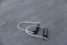 "ATTENTION I am going to be out of the studio EVERY WEEKEND from Friday to Monday. All orders placed Friday to Sunday are going to be processed and shipped following Tuesday and Wednesday, so please, plan accordingly. Less is more for these earrings! U-shape simple earrings hold black polished agate and securely close with hoop-like closure. Simple and elegant, great for everyday or as a subtle statement piece. Color combination is classical, gold or silver and black. it's timeless! You get to c Modern Black Handmade Hoop Earrings, Black Minimalist Sterling Silver Hoop Earrings, Modern Handmade Black Hoop Earrings, Black Sterling Silver Hoop Earrings For Everyday, Modern Black Hoop Earrings For Everyday, Everyday Black Sterling Silver Hoop Earrings, Minimalist Handmade Black Hoop Earrings, Black Minimalist Handmade Hoop Earrings, Black Minimalist Hoop Earrings For Gift